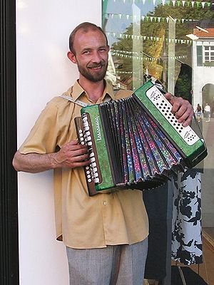 Busking Accordionist in Dorsten. Pictured accordion is the Russian instrument called a Garmon